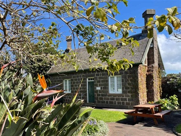 Curators Cottage with bird of paradise