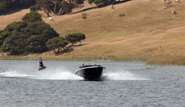 People wake surfing